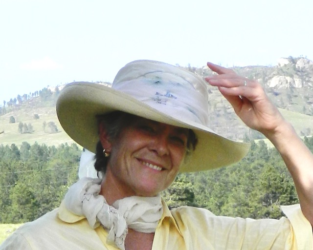 Regina Ochoa with hat and scarf